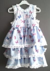 Robe bleu  papillon 8 ans